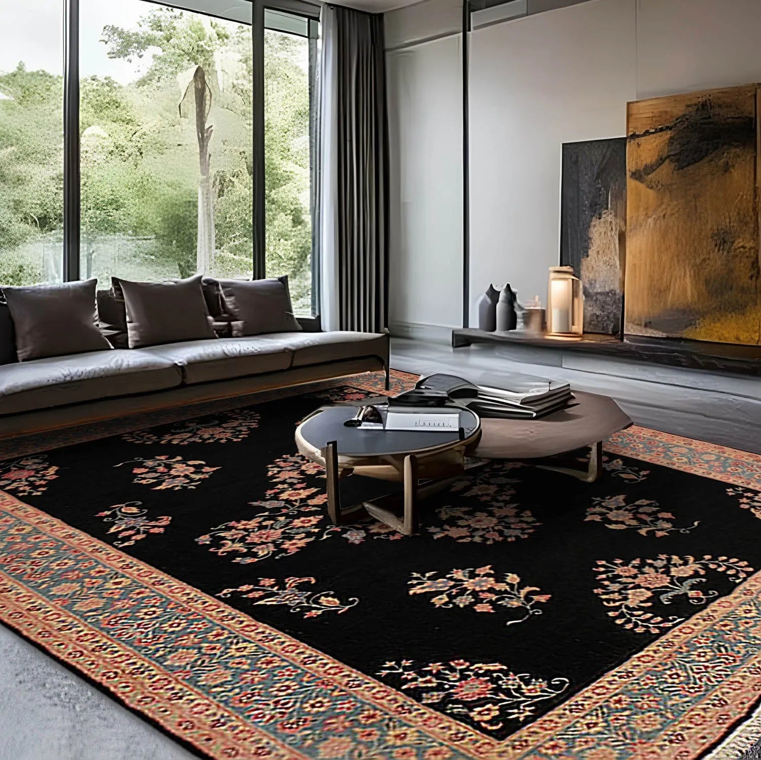 Modern living room with a black and multicolor patterned rug, gray sofa, and wooden coffee table.
