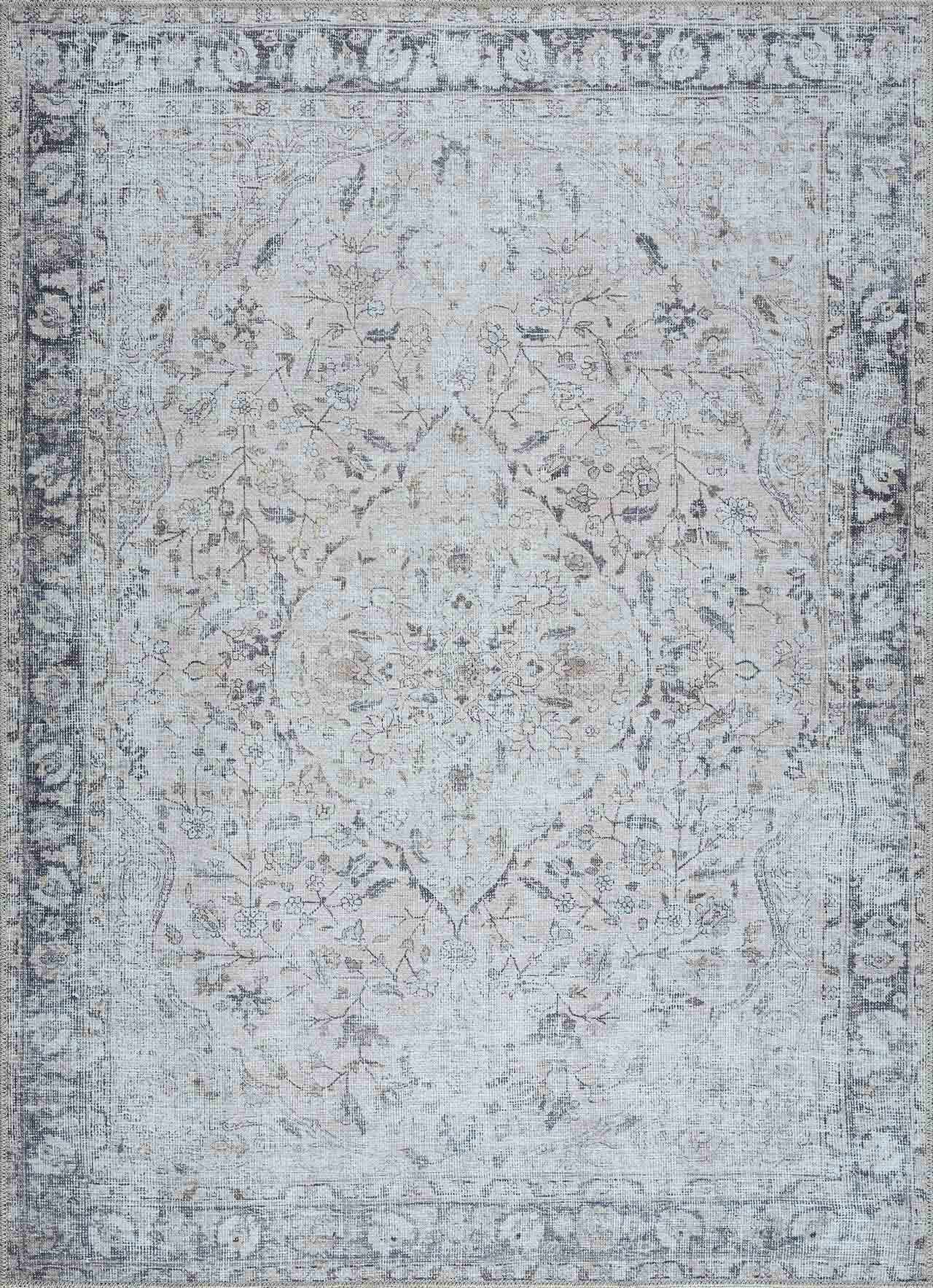 Patterned rug with a mix of colors on a plain background
