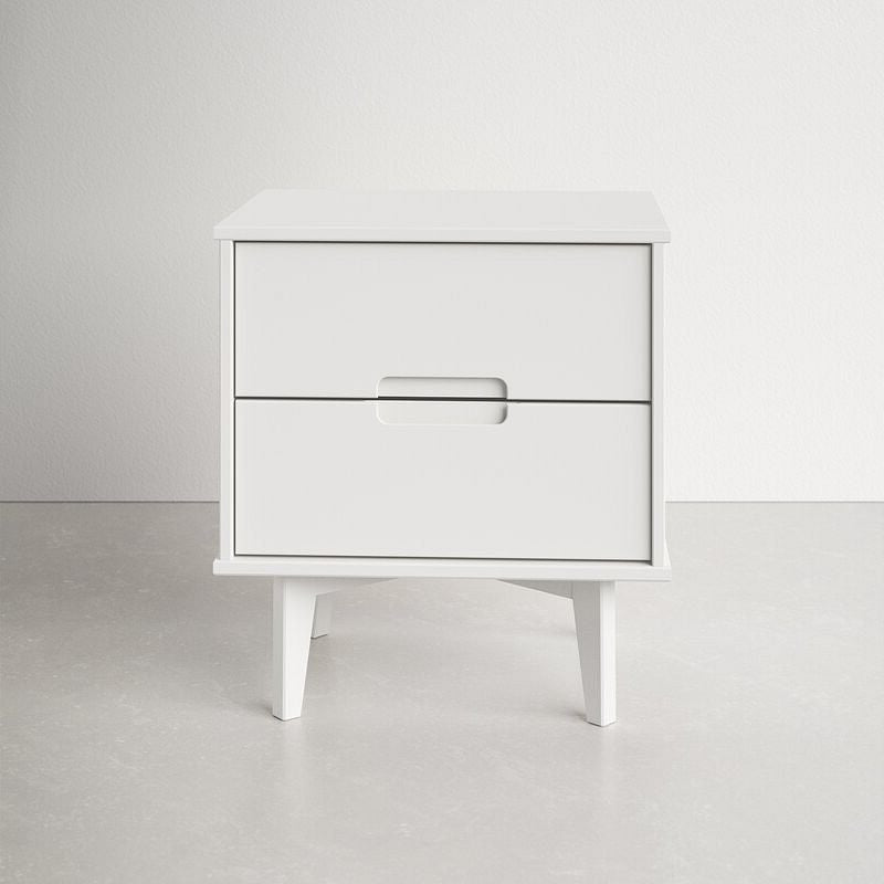 White nightstand with two drawers on a light gray background