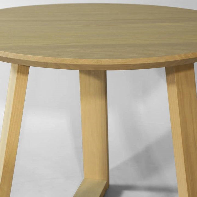 Wooden round table on a white background