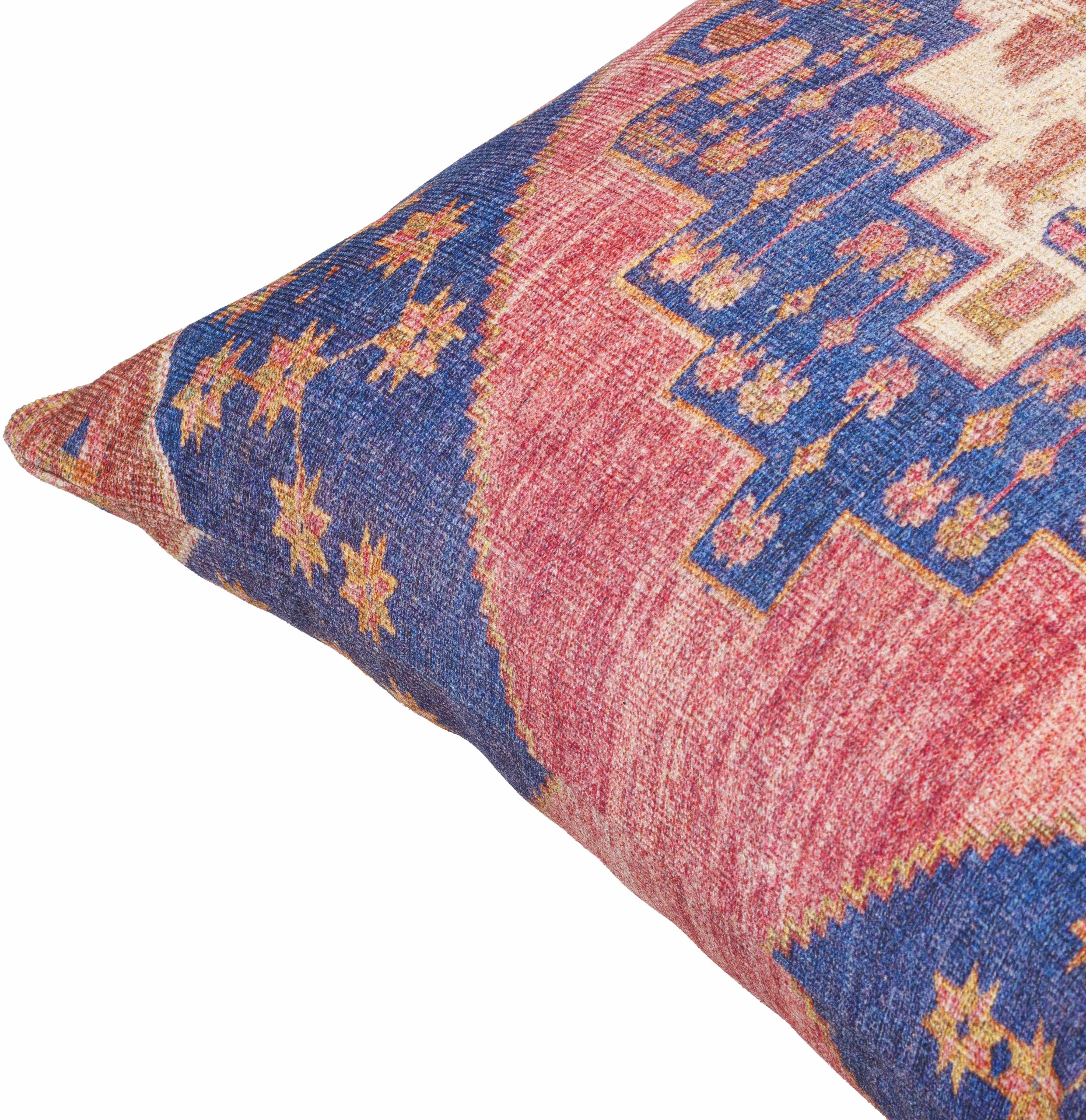 Decorative pillow with intricate patterns on a white background