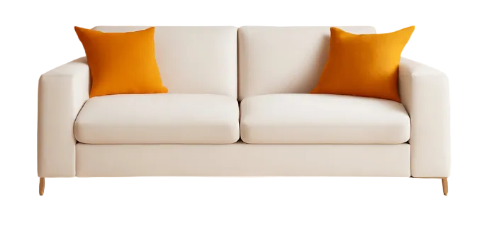 White sofa with orange cushions against a beige wall