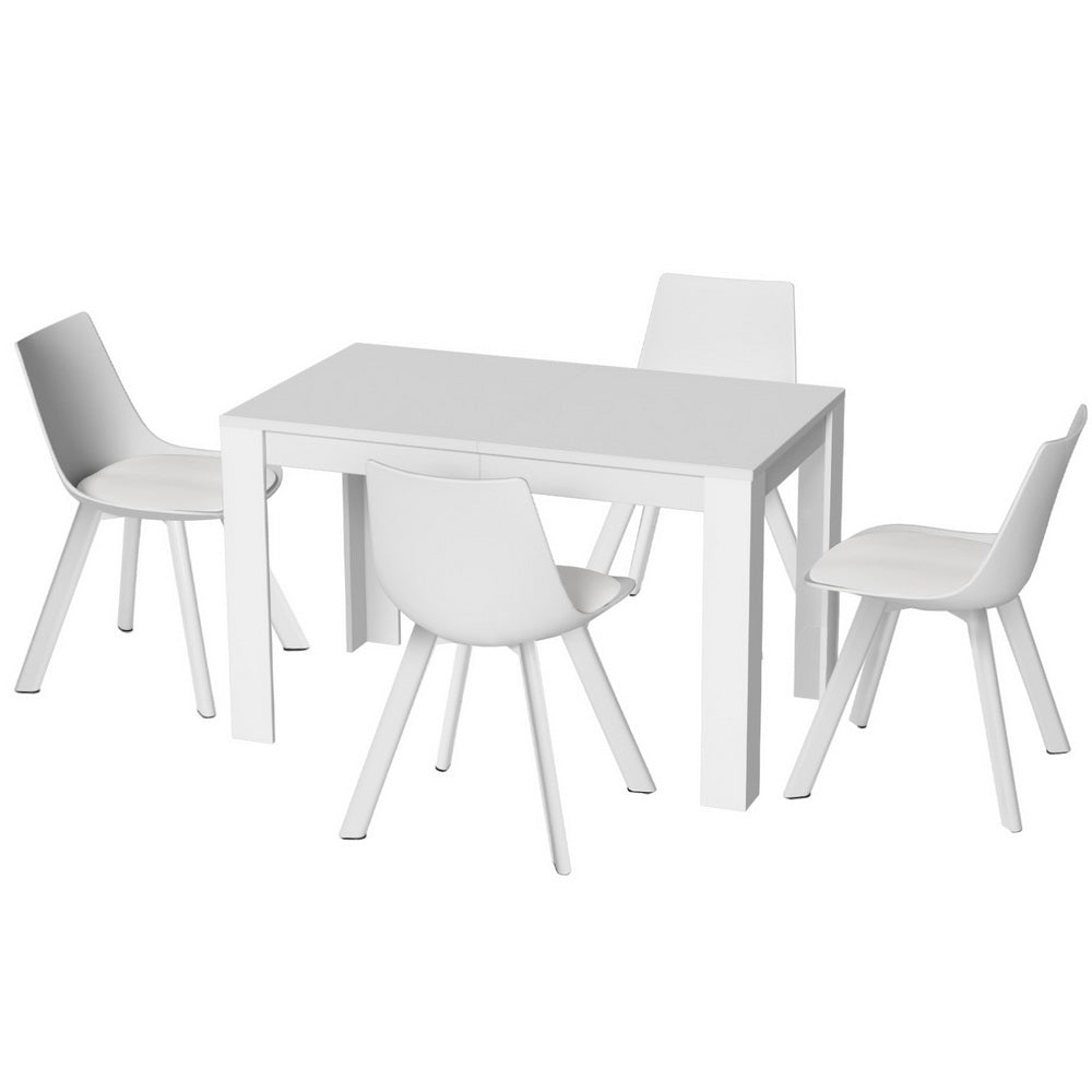 White table with four matching chairs on a white background
