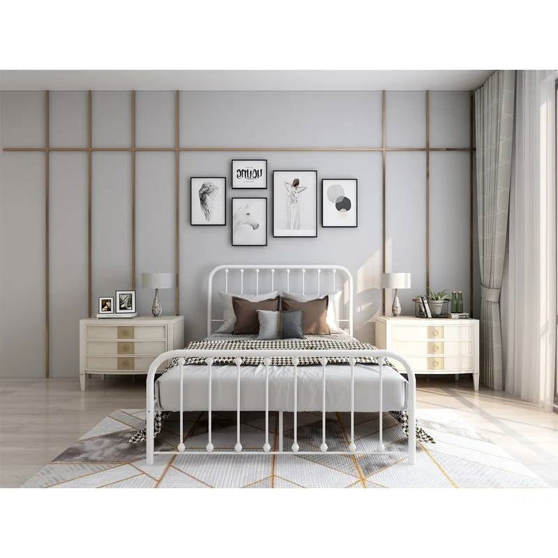 Modern bedroom with a white metal bed, nightstands, and wall art.