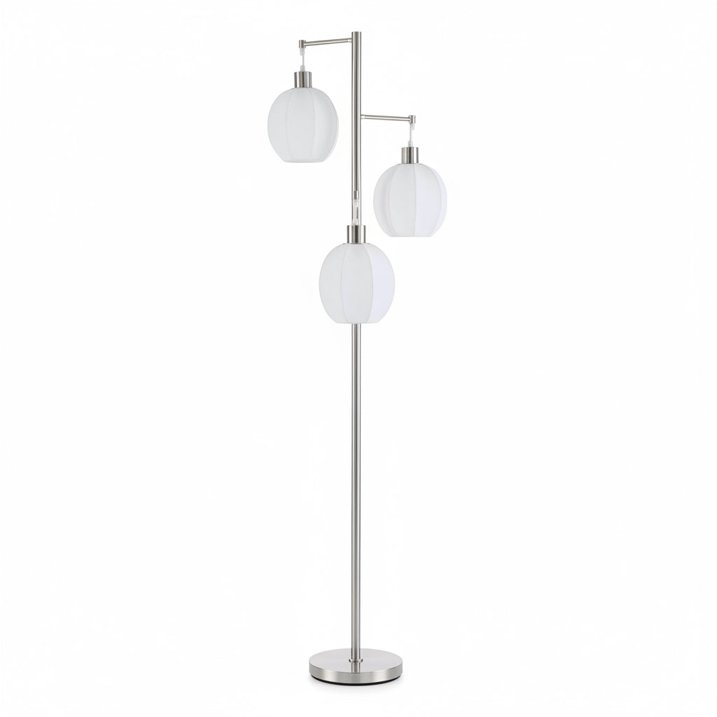 Floor lamp with three spherical glass shades on a white background