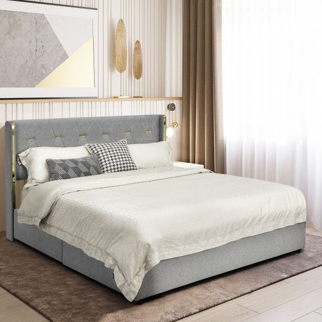Gray upholstered bed with white bedding in a bedroom setting