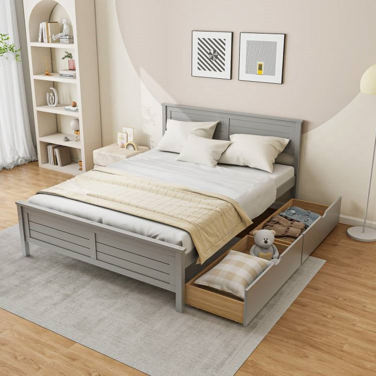 Gray bed with storage drawers in a bedroom setting