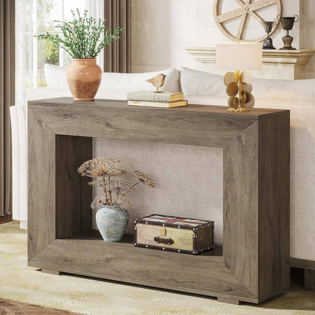 Wooden console table with decorative items in a living room setting