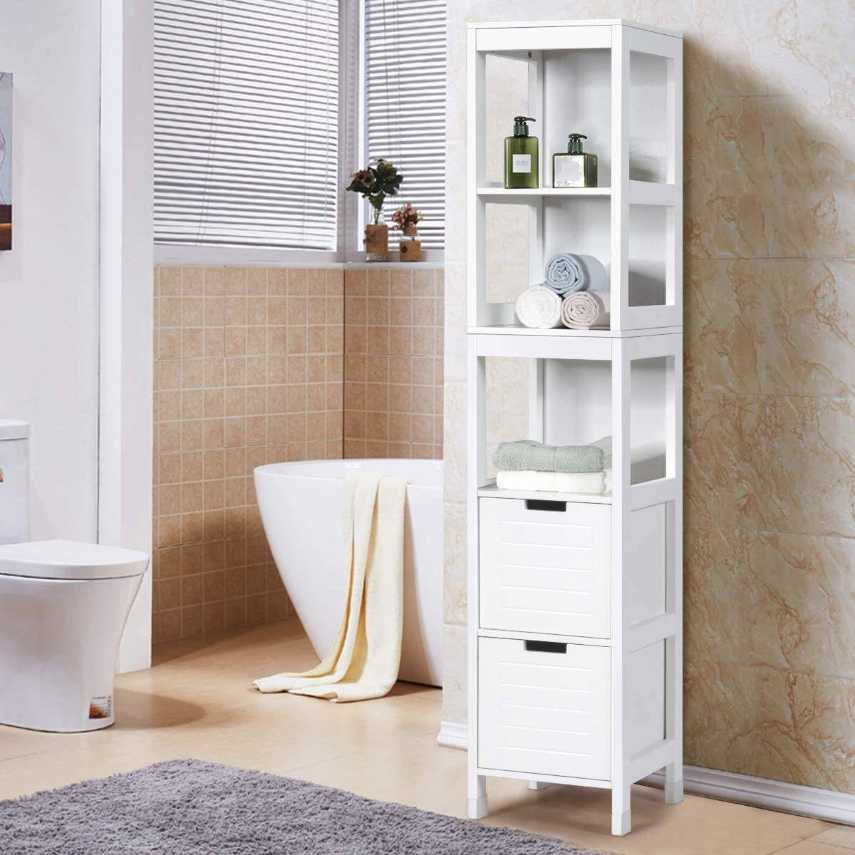White bathroom cabinet with shelves and drawers in a tiled bathroom.