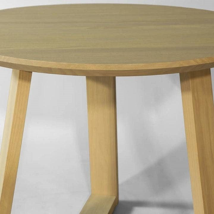 Wooden round table on a white background