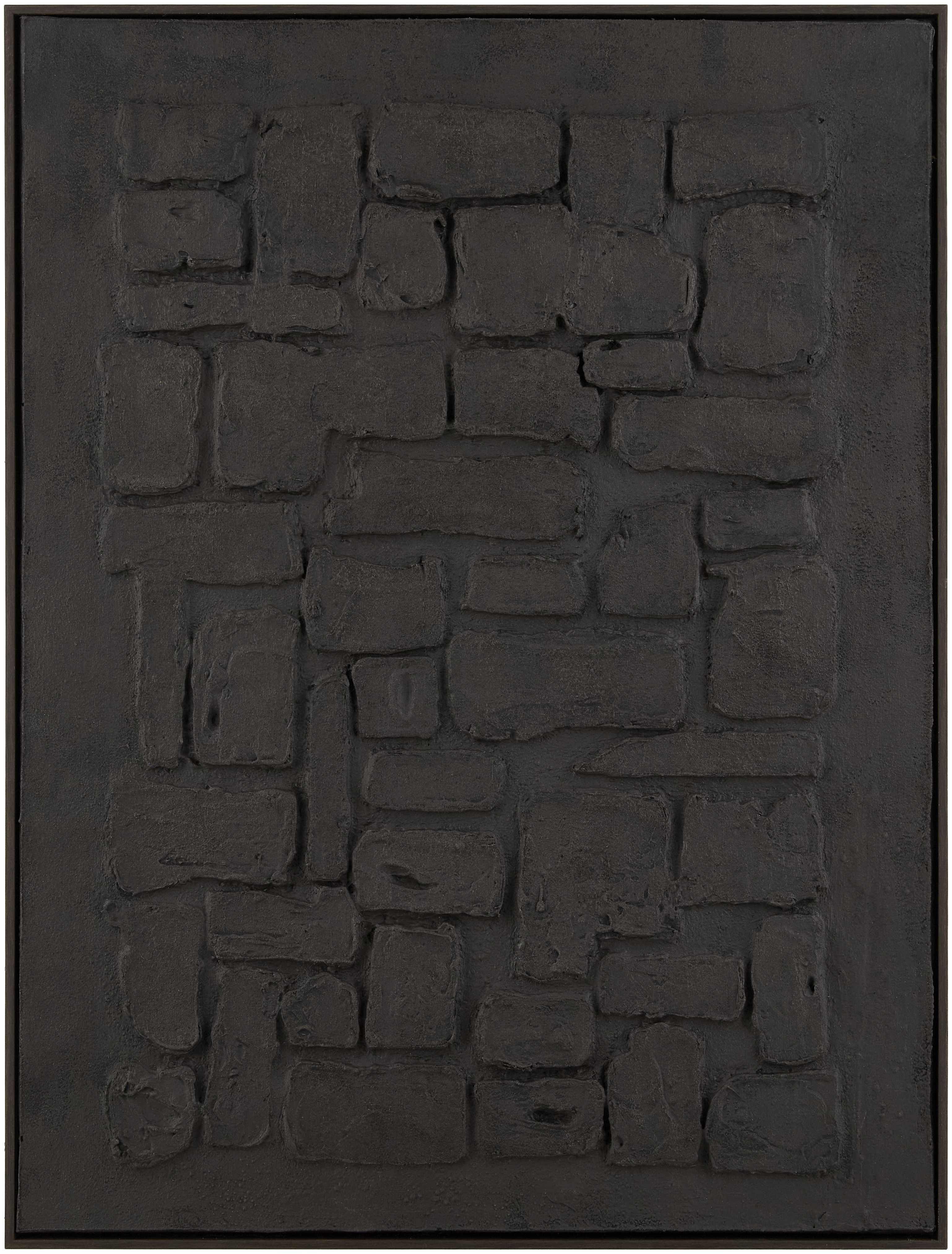 Dark gray textured stone-patterned rug
