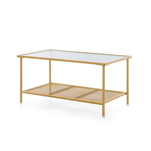 Gold metal coffee table with a glass top on a white background