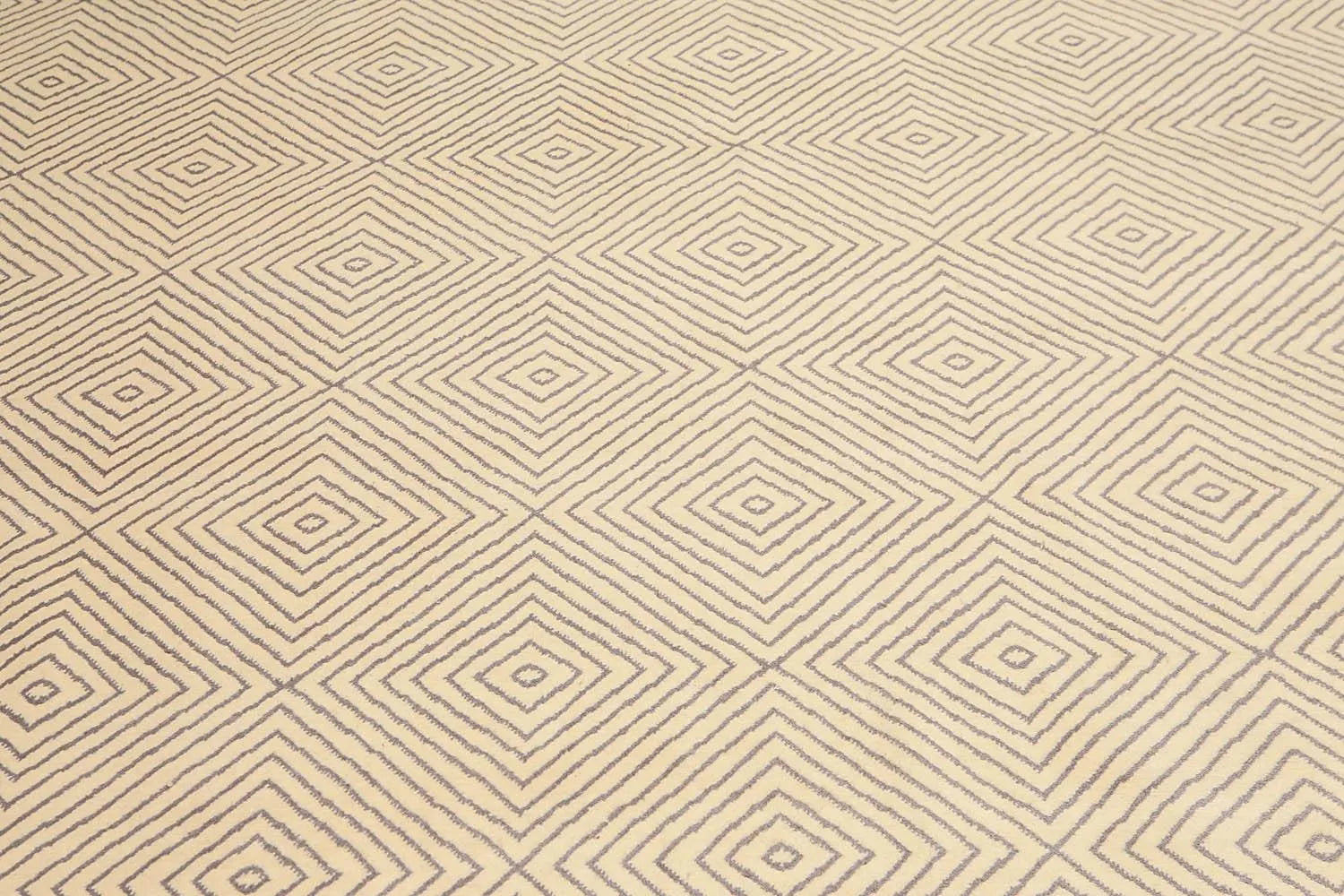 Beige fabric with a geometric diamond pattern