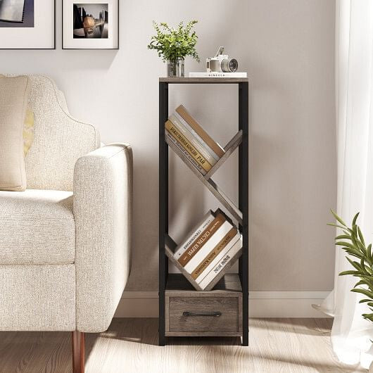 Tall black and gray bookshelf with books and a plant in a living room setting.