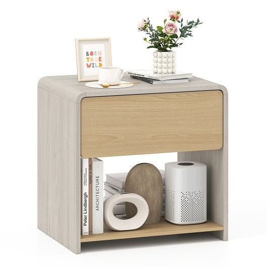 Small wooden side table with a drawer and shelf, featuring decorative items on a white background.
