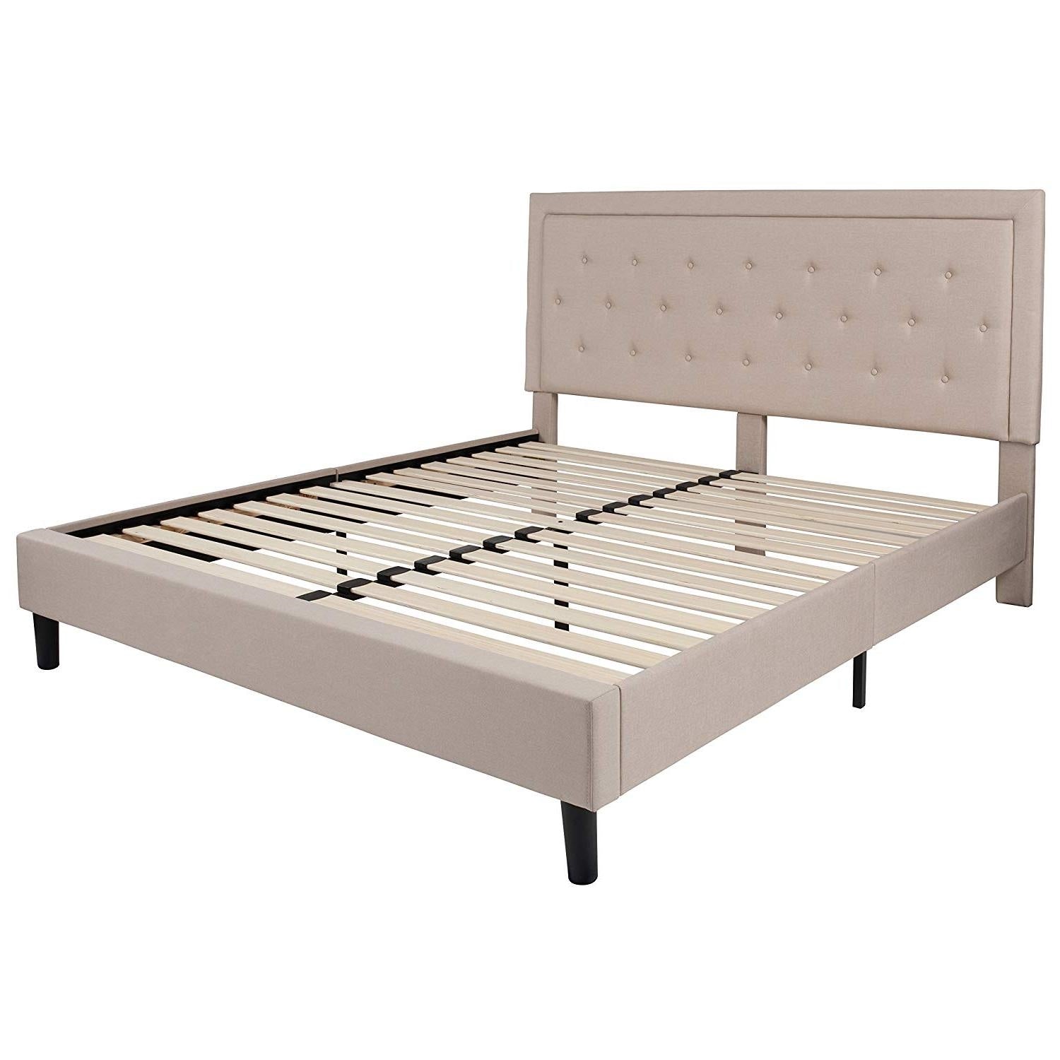 Beige upholstered bed frame with slatted design on a white background