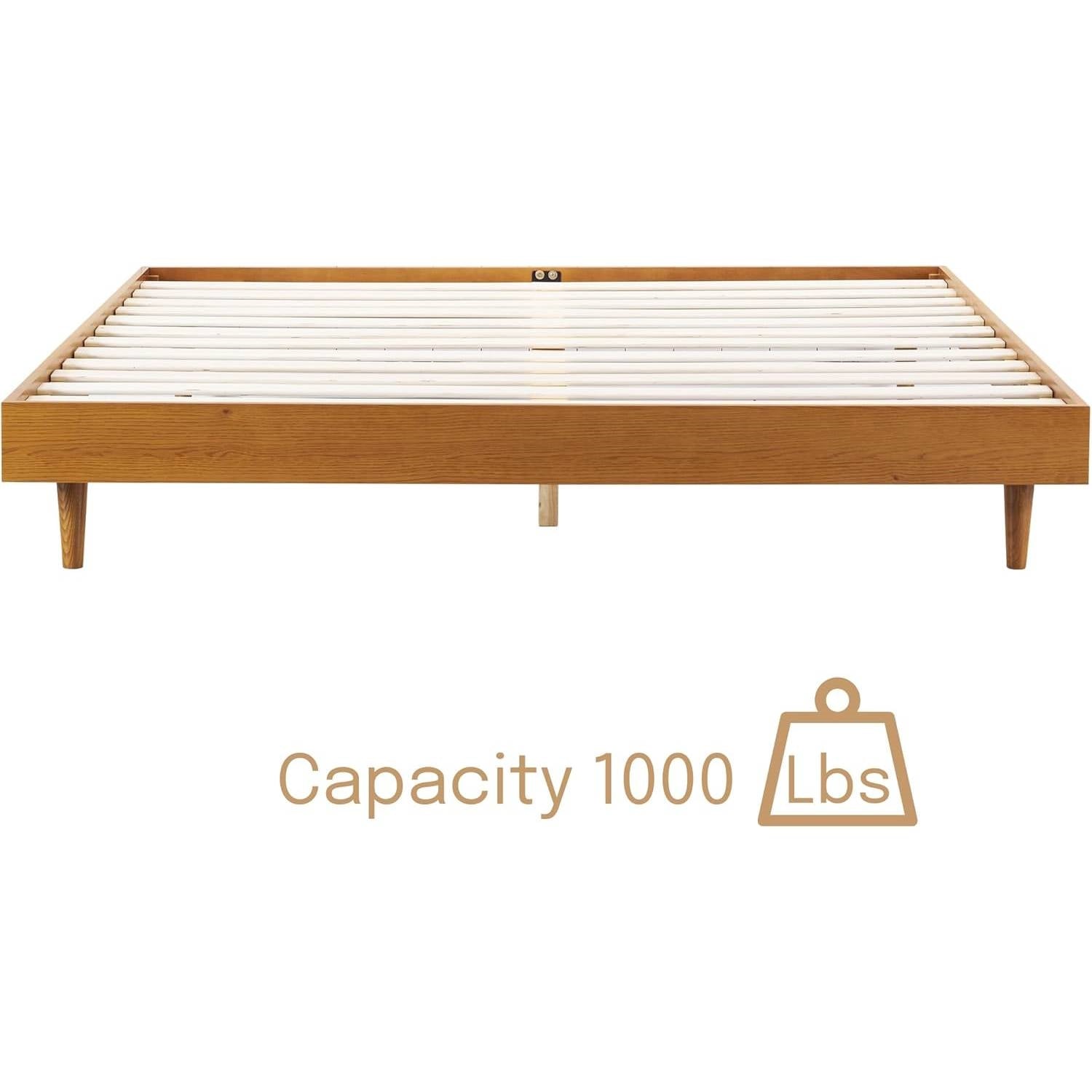 Wooden bed frame with slats on a white background, indicating a weight capacity of 1000 lbs.