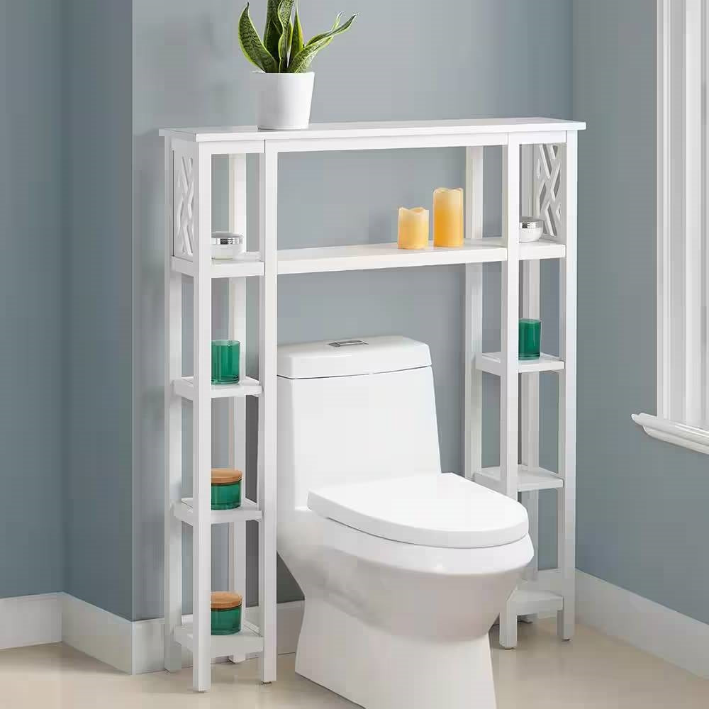 White over-the-toilet shelf with decorative items against a gray wall.