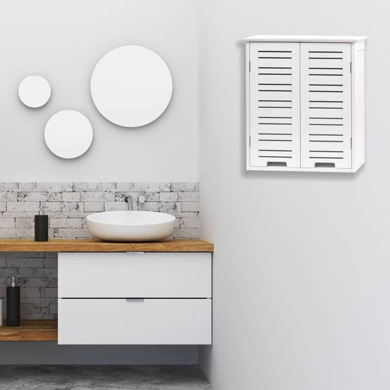 Bathroom interior with a vanity, round mirrors, and a window with shutters.