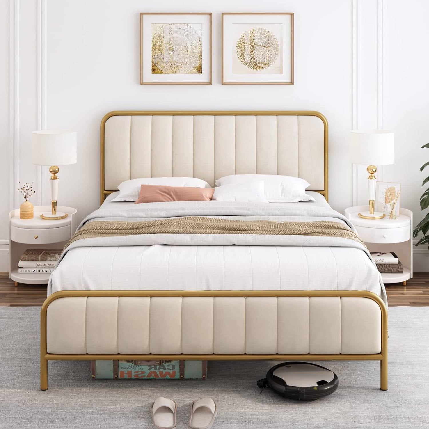 Neatly made bed with gold frame and white bedding in a bedroom setting.