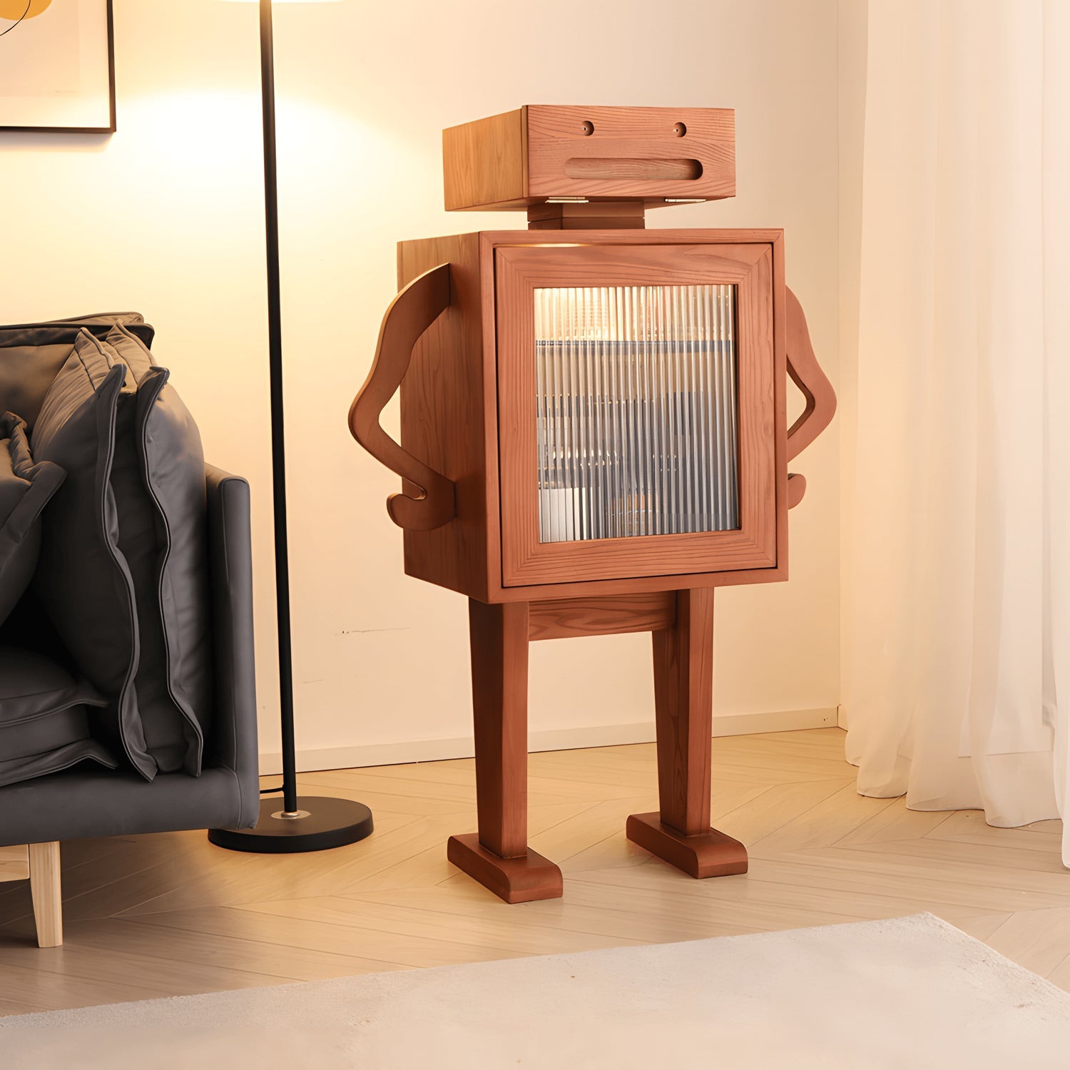 Wooden robot sculpture in a room with a couch and lamp