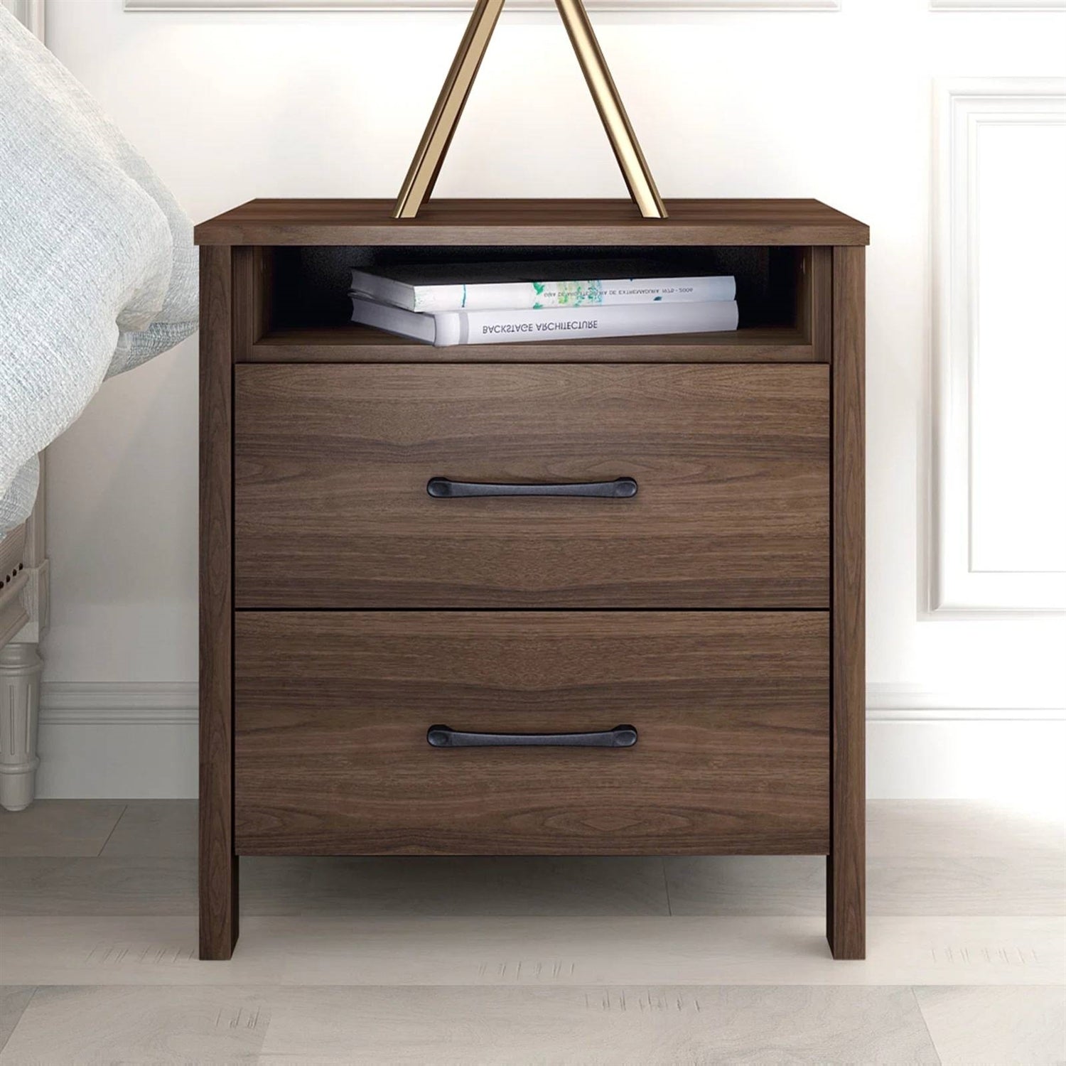 Wooden nightstand with two drawers in a bedroom setting