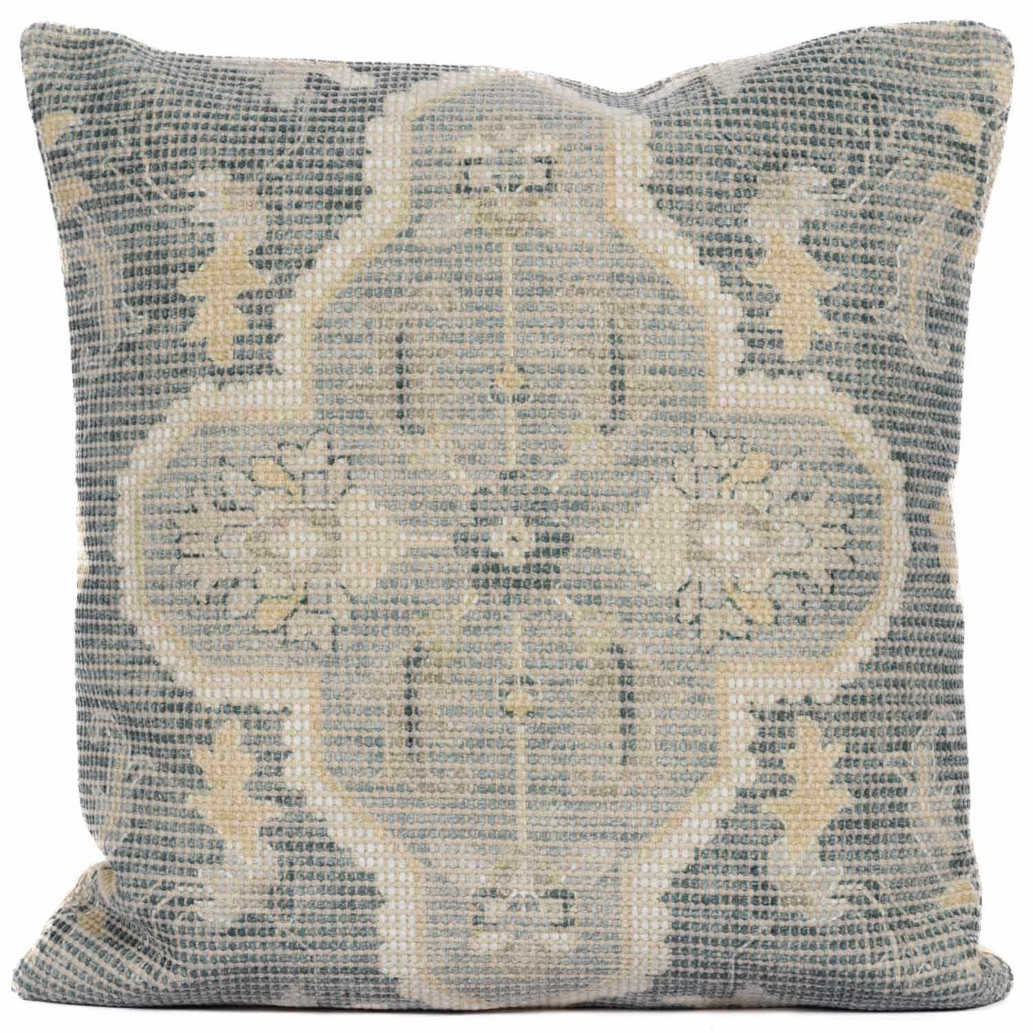 Decorative pillow with intricate pattern on a plain background