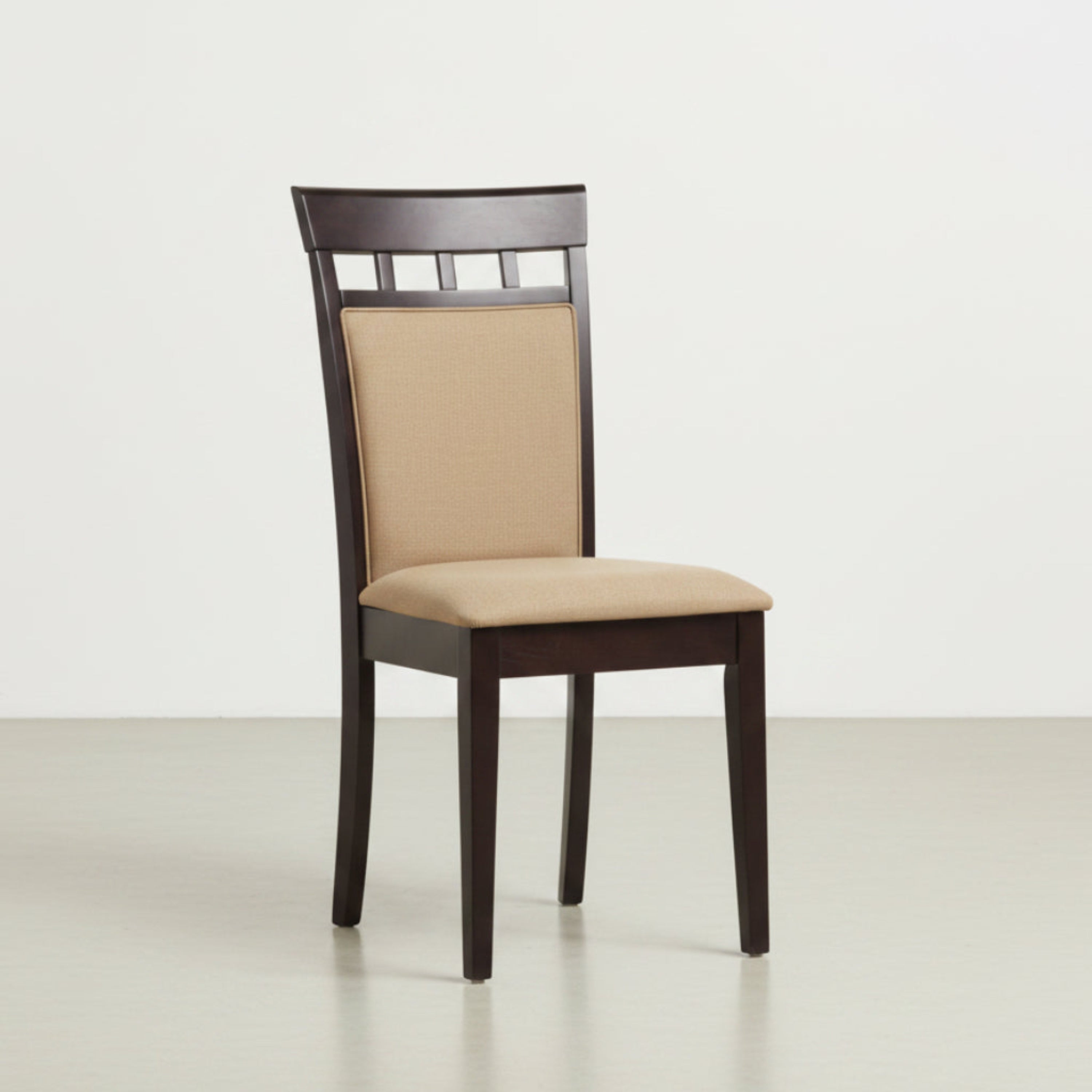 Dining chairs with wooden frames and beige cushioned seats on a light wood floor.