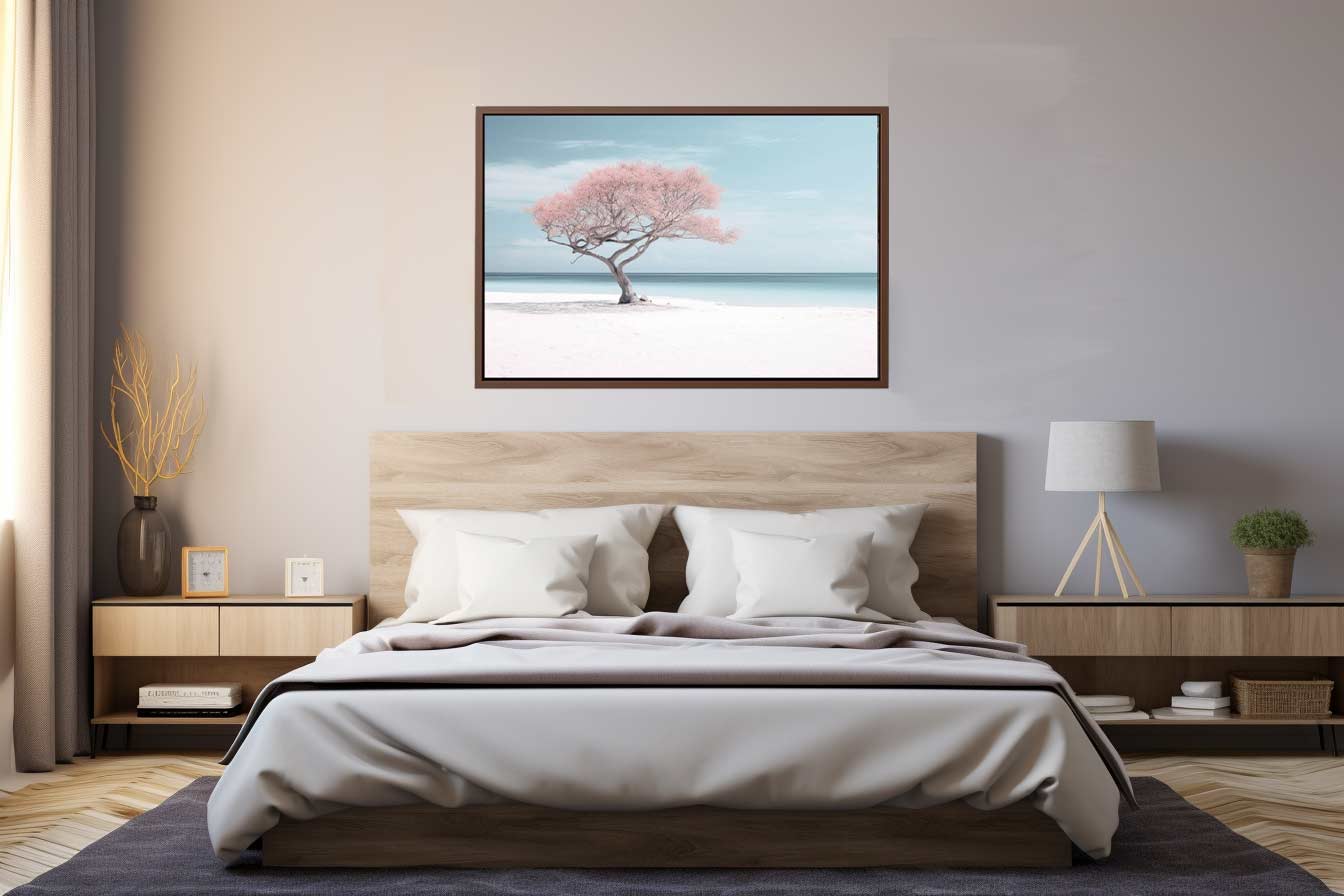 Bedroom with wooden headboard, white bedding, and framed artwork of a tree on the wall.