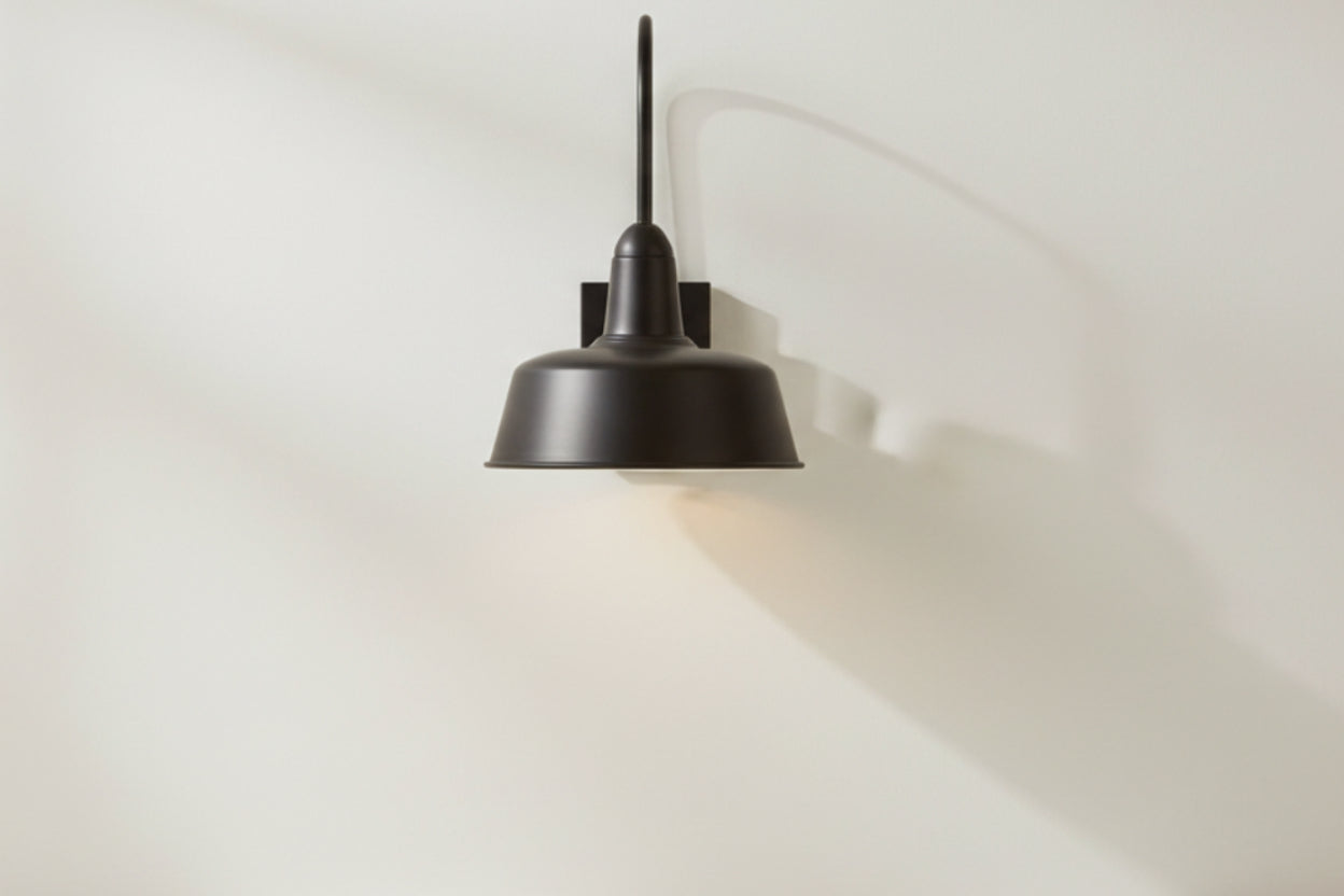 Black pendant light fixture on a white background
