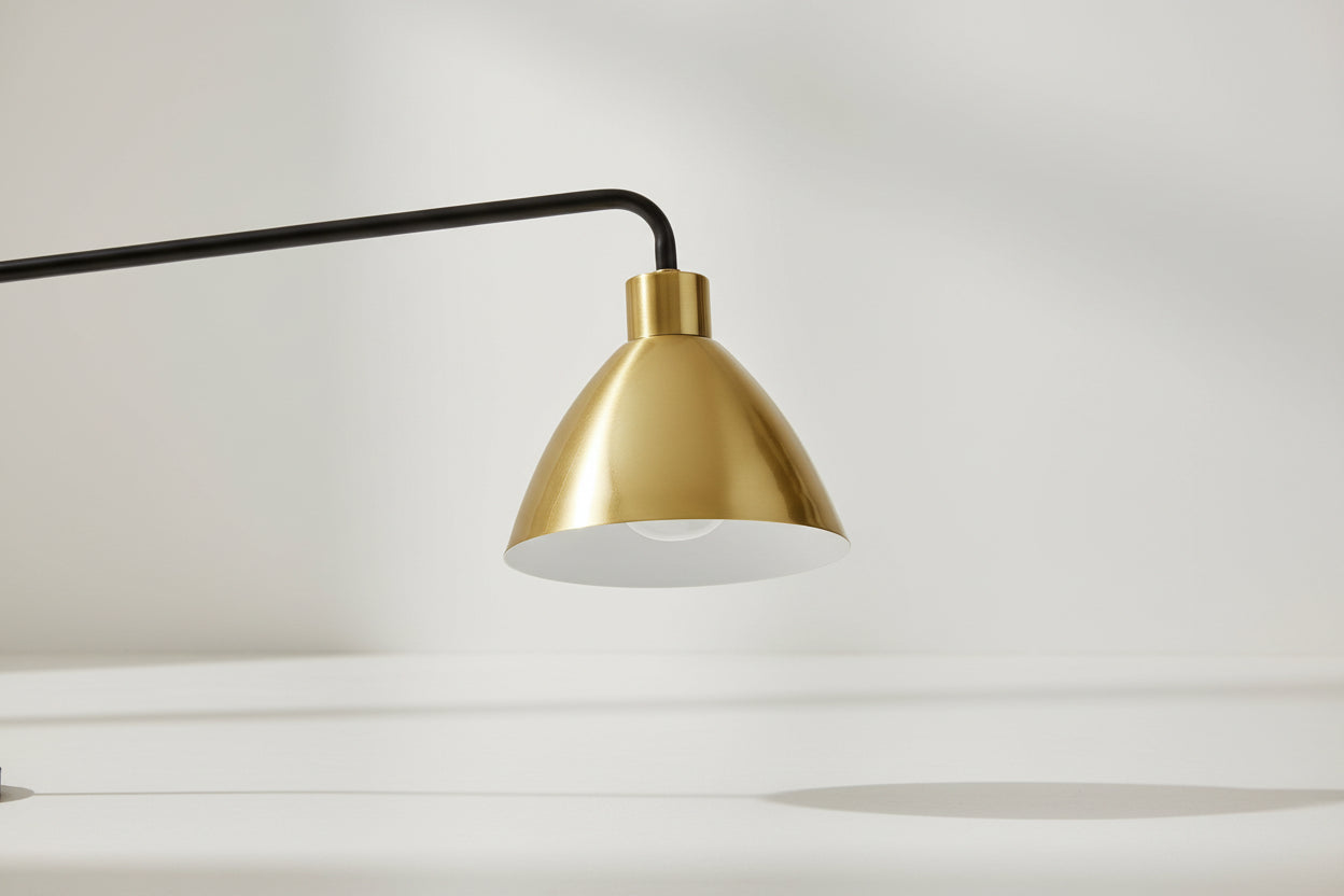 Gold and white lampshade on a white background