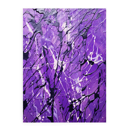 Abstract art piece with splashes of purple, black, and white on a white background