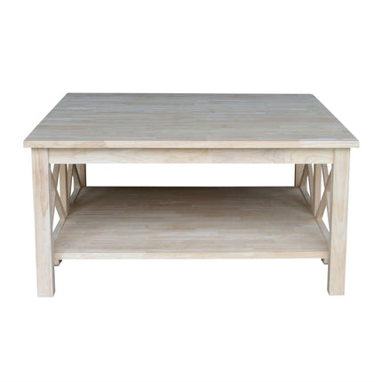 Wooden coffee table with a light finish on a white background