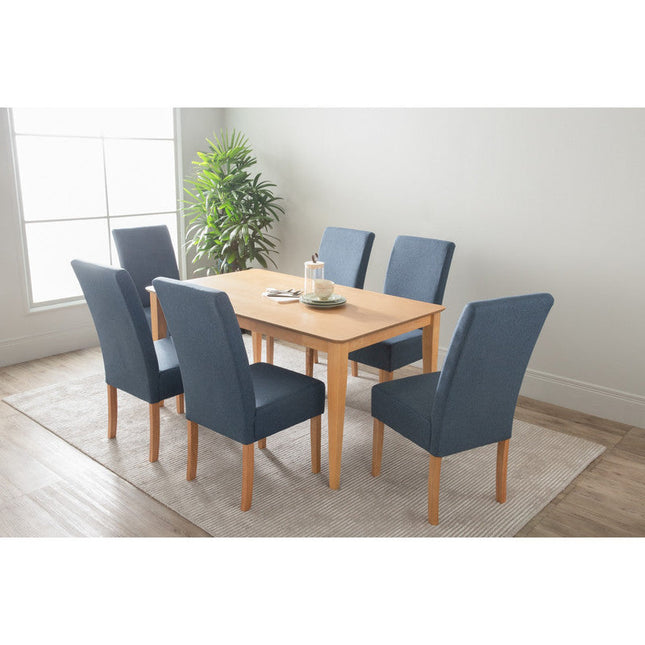 Dining table set with six blue chairs in a room with a plant and window.
