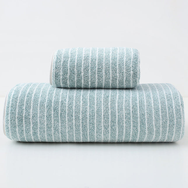 Two striped towels stacked on a white background