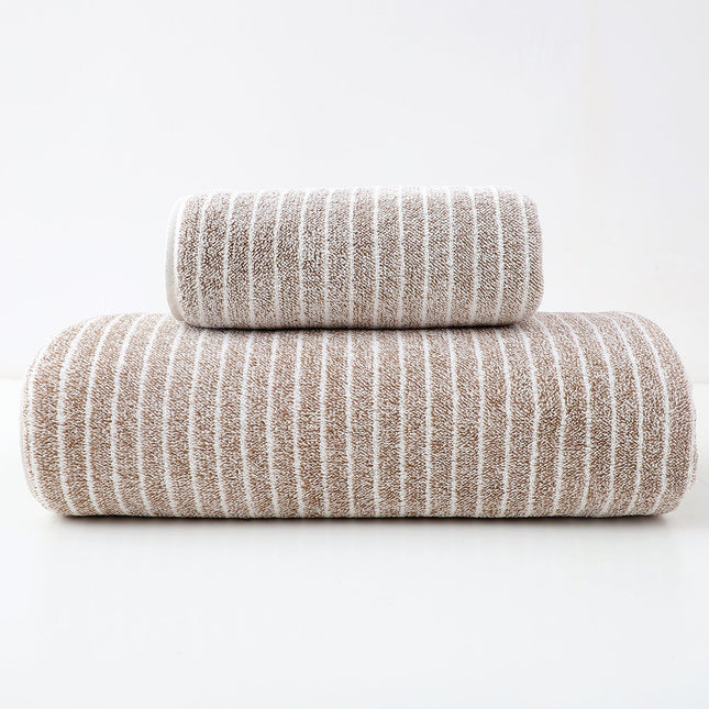 Two striped towels stacked on a white background