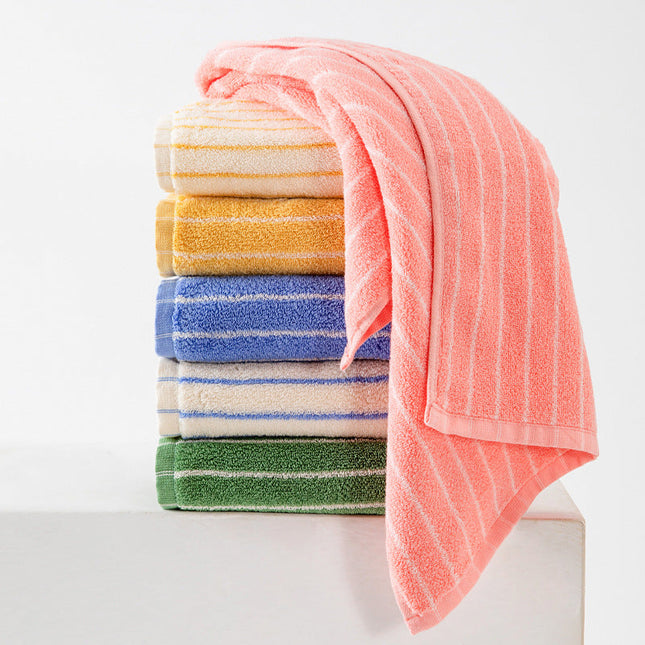 Stack of colorful striped towels on a white background