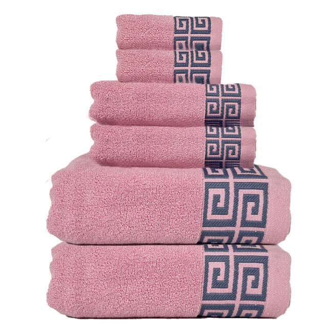 Set of pink towels with decorative blue patterns on a white background