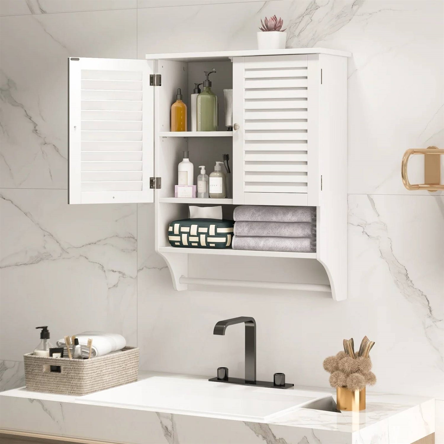 White bathroom cabinet with open doors displaying toiletries against a marble wall.