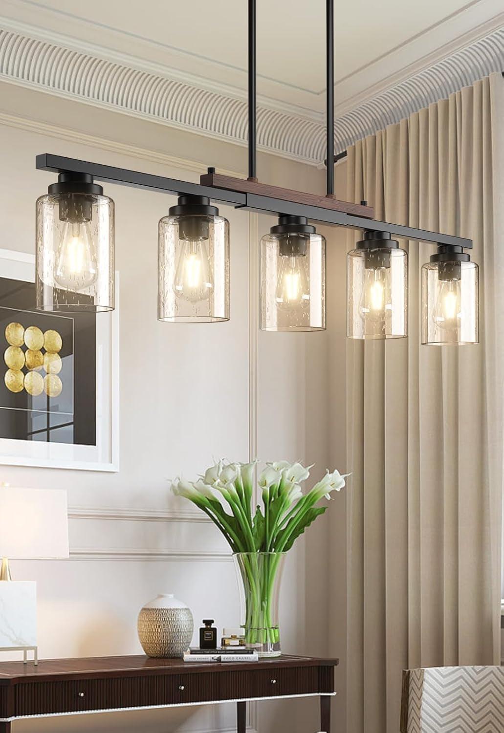 Modern chandelier with glass shades in a stylish interior setting.