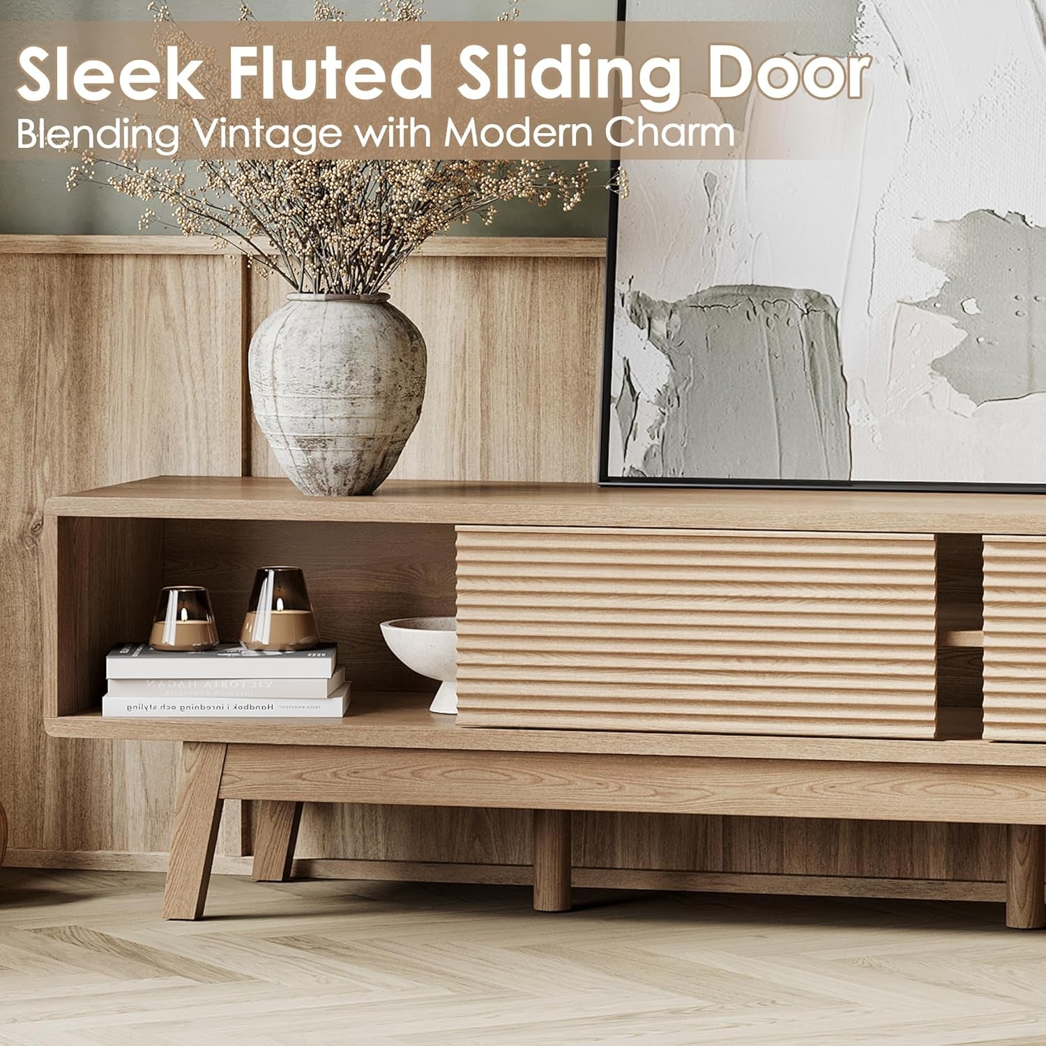 Wooden console table with decorative items against a wall with a fluted sliding door design.