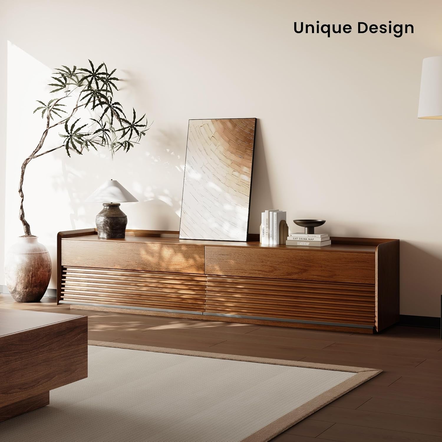 Wooden console table with decorative items in a modern interior setting