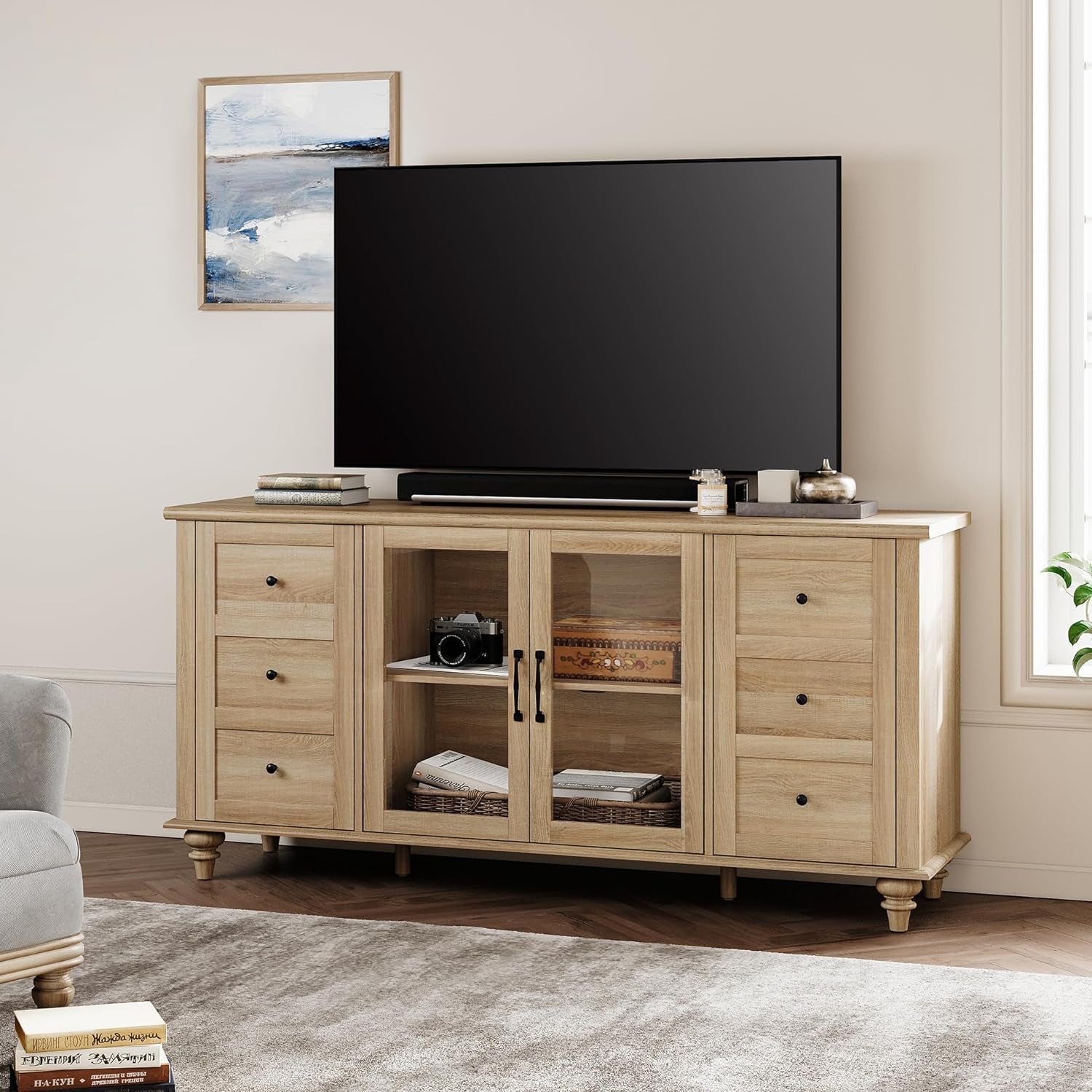 Wooden TV stand with a television in a living room setting