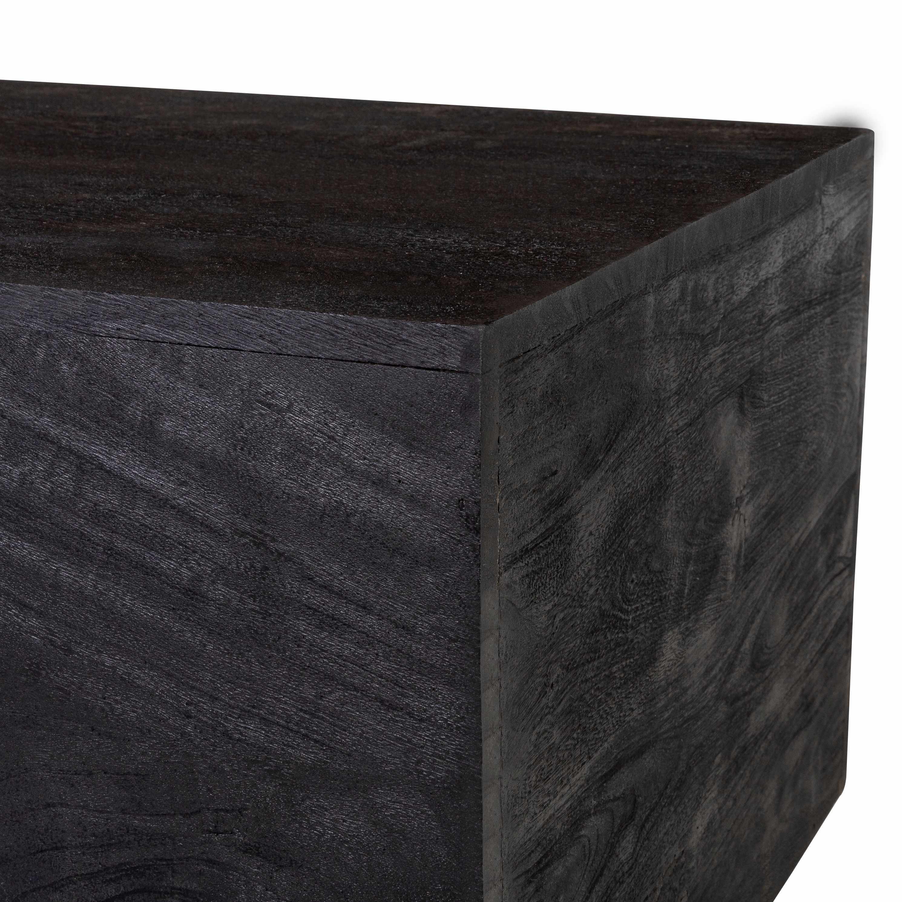 Black stone wedge on a white background
