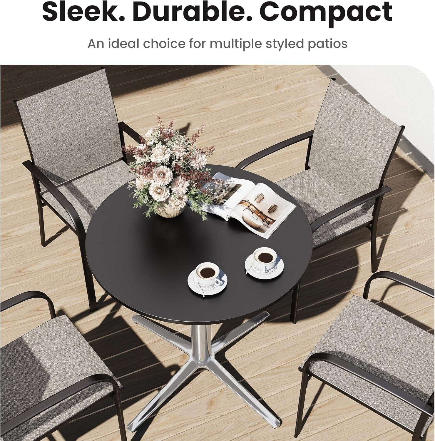 Outdoor patio set with black table and gray chairs on a wooden deck.