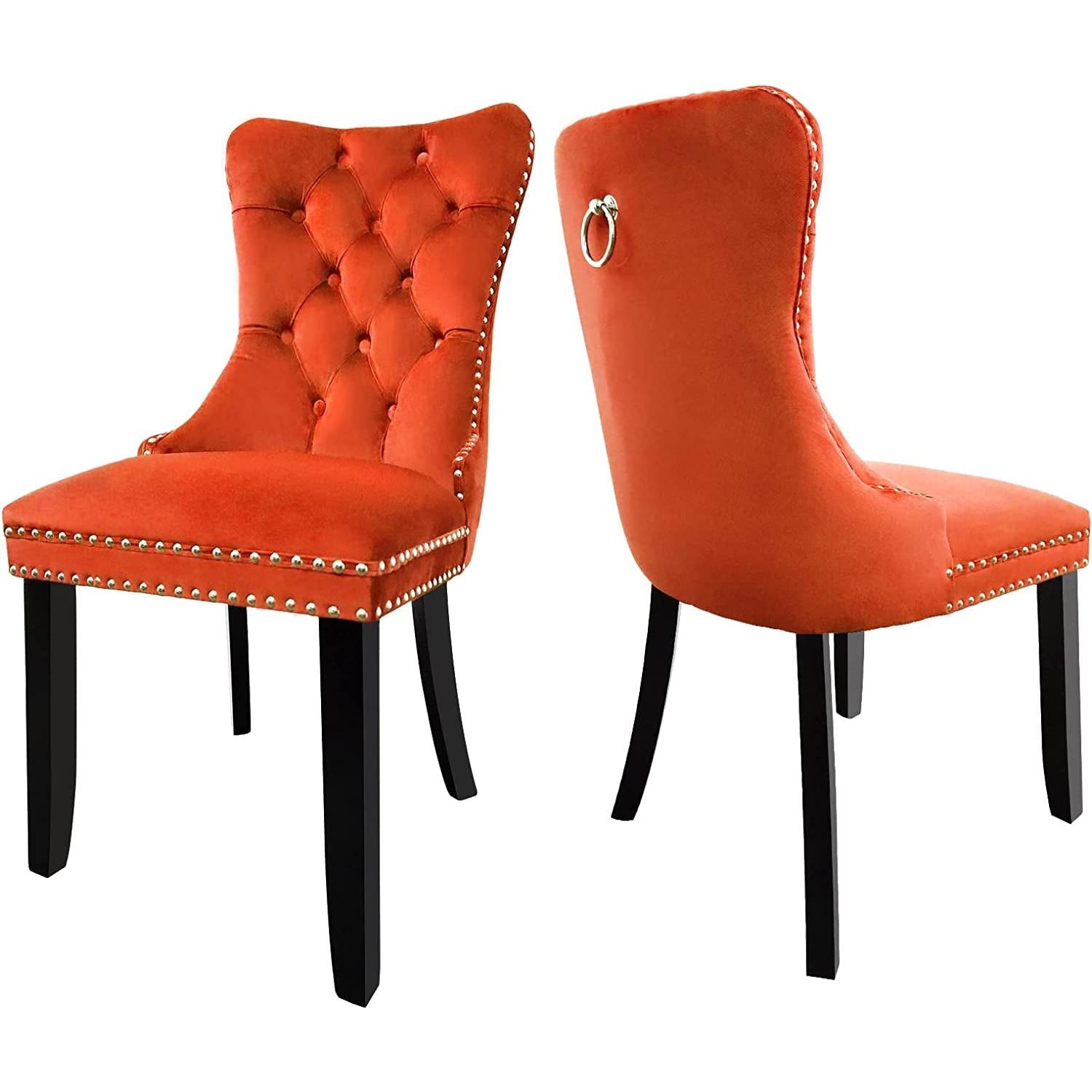 Two orange upholstered chairs with black legs on a white background