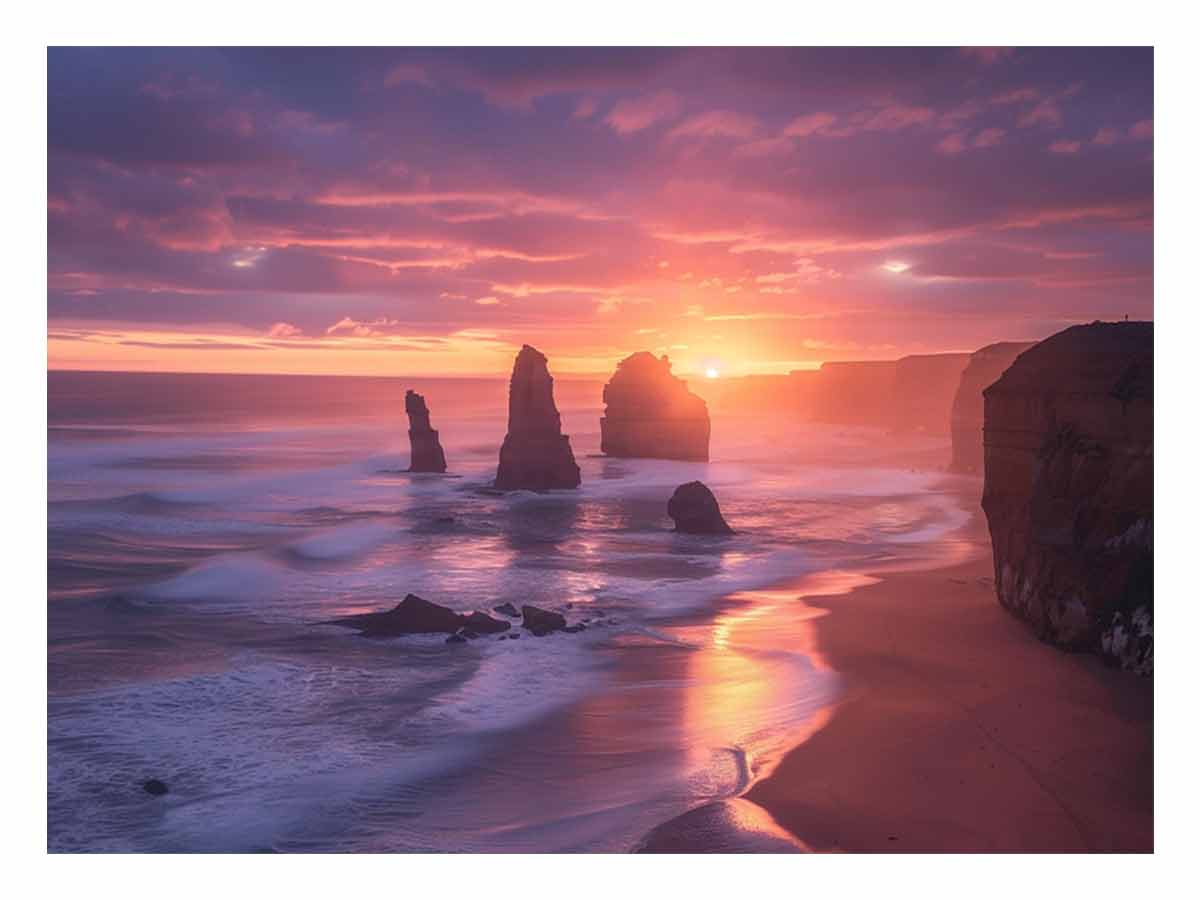 Sunset over a beach with rock formations