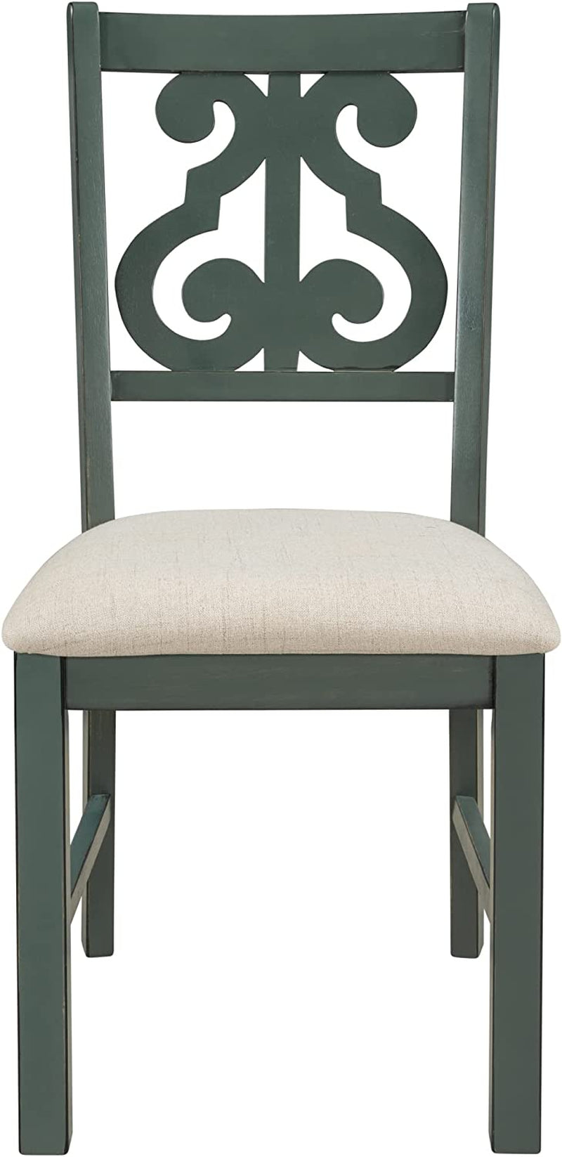 Green chair with decorative backrest and beige cushion on a white background
