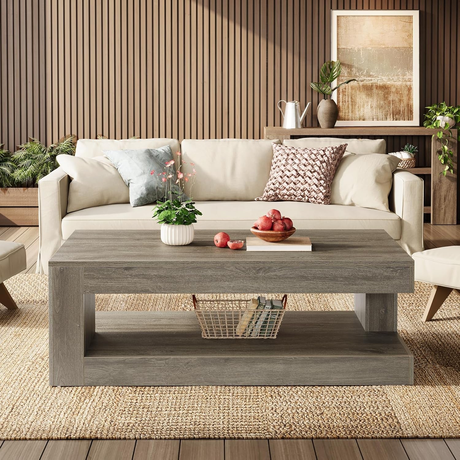 Living room with a beige sofa, wooden coffee table, and decorative items.