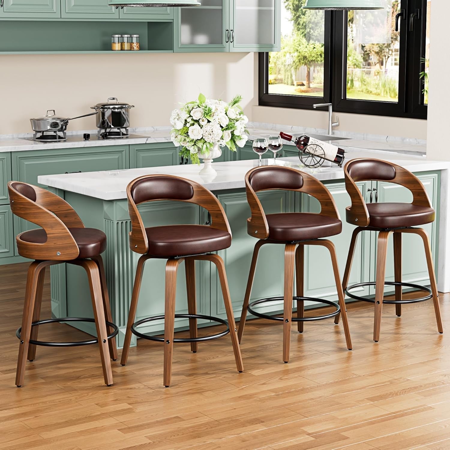 Four brown bar stools in a kitchen setting with green cabinets and a window.